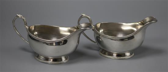 A pair of modern silver sauceboats, Birmingham, 1965/6, 12 oz.